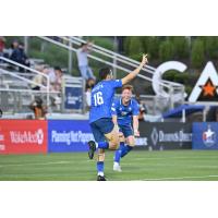 Rodrigo Da Costa of North Carolina FC celebrates with Adam Luckhurst
